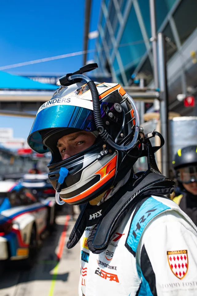 Tommy Foster in his helmet in the pit lane, ready to drive